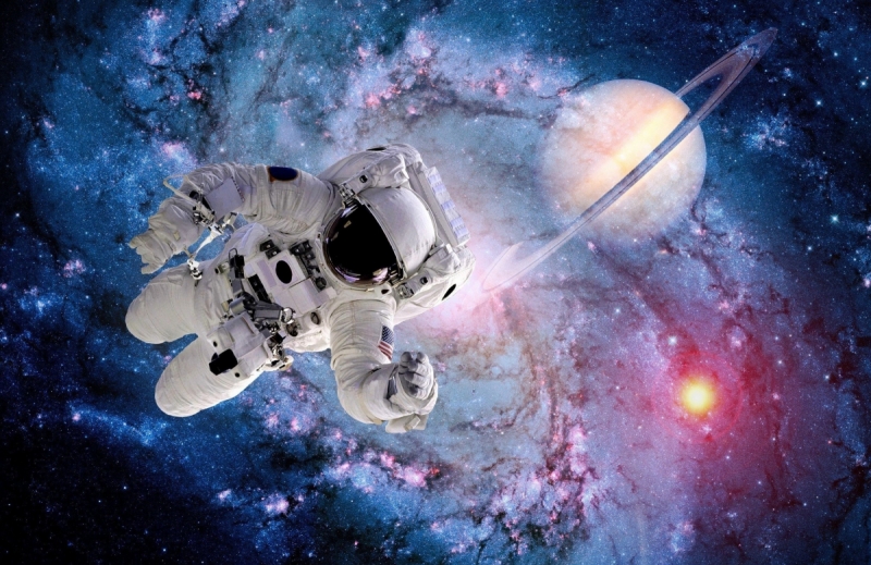 Nebula wall murals & wallpaper Saturn and Cosmonaut In Space Art. No: 10000008544